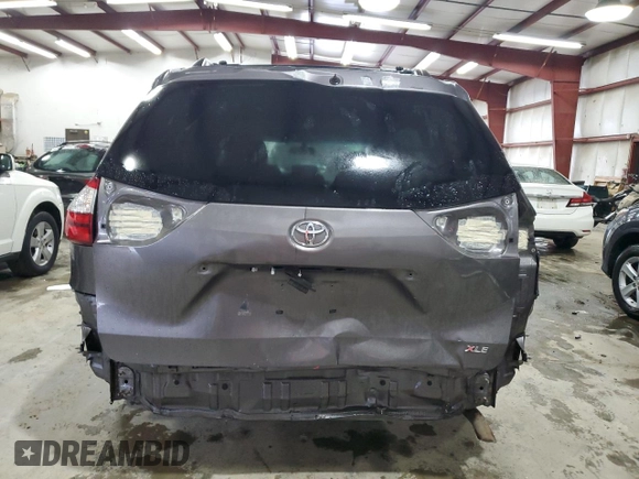 2015 Toyota Sienna XLE с VIN 5TDYK3DC4FS650605, выставлен на аукционе Copart как лот 58217575 с пробегом 174 364 миль миль и Списание • Salvage title. История ставок и продаж доступна на DreamBid. Изображение 6.