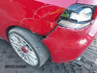 2012 Volkswagen GTI w/Conv & Sunroof z VIN WVWEV7AJ9CW292286, wystawiony jako IAAI lot #41478359 z przebiegiem 153 000 mil mil oraz . Historia ofert i sprzedaży dostępna na DreamBid. Obrazek 6.