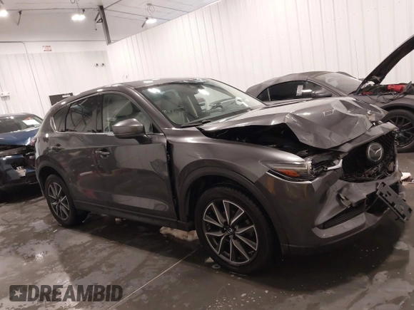2017 Mazda CX-5 Grand Touring with VIN JM3KFADLXH0151593, listed as a IAAI auction lot 41823378 with 149,299 mi miles. Bid and sale history available at carsss.com. Image 13.