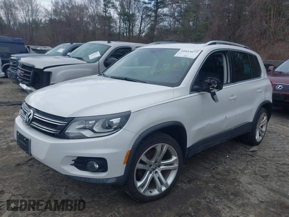 2012 Volkswagen Tiguan S with VIN WVGBV7AX0CW543697, listed as a IAAI auction lot 41853077 with 113,002 mi miles and . Bid and sale history available at DreamBid. Image 2.