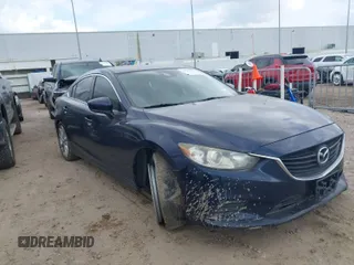 2017 Mazda Mazda6 Touring with VIN JM1GL1V54H1107722, listed as a IAAI auction lot 41521257 with 142,129 mi miles. Bid and sale history available at carsss.com. Image 1.