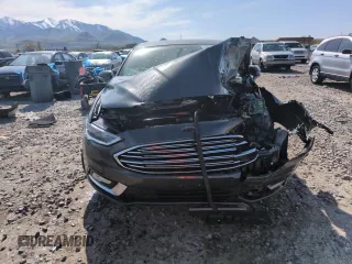 2017 Ford Fusion SE z VIN 3FA6P0H98HR350163, wystawiony jako Copart lot #54196545 z przebiegiem Nie podano mil oraz Szkoda całkowita • Salvage title. Historia ofert i sprzedaży dostępna na DreamBid. Obrazek 5.