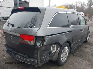 2014 Honda Odyssey LX z VIN 5FNRL5H2XEB009962, wystawiony jako IAAI lot #41902277 z przebiegiem 152 661 mil mil oraz . Historia ofert i sprzedaży dostępna na DreamBid. Obrazek 4.