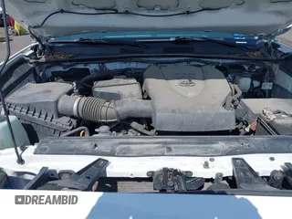 2020 Toyota Tacoma SR5 with VIN 3TMCZ5AN5LM339977, listed as a IAAI auction lot 41886937 with 94,986 mi miles and . Bid and sale history available at DreamBid. Image 10.