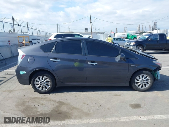 2014 Toyota Prius with VIN JTDKN3DPXE3054379, listed as a IAAI auction lot 42080665 with Not provided miles and . Bid and sale history available at DreamBid. Image 13.