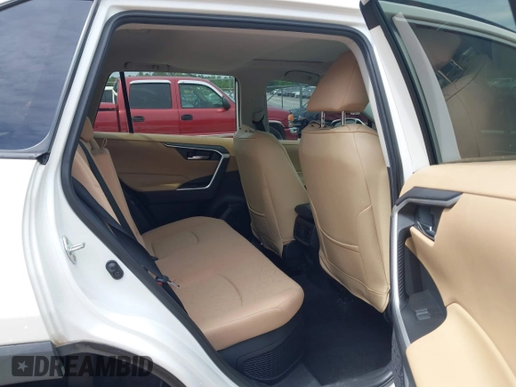 2020 Toyota RAV4 Hybrid XLE with VIN 2T3RWRFV5LW094731, listed as a IAAI auction lot 42349123 with 60,927 mi miles and . Bid and sale history available at DreamBid. Image 8.