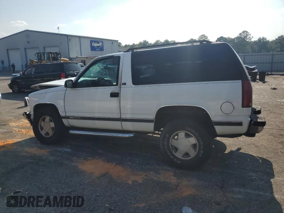 1995 GMC Yukon with VIN 1GKEK18K2SJ700616, listed as a Copart auction lot 68582034 with 205,980 mi miles and Salvage Title. Bid and sale history available at carsss.com. Image 2.
