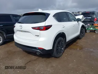 2022 Mazda CX-5 • with VIN JM3KFBAY5N0524251, listed as a IAAI auction lot 41591692 with 28,493 mi miles and . Bid and sale history available at carsss.com. Image 4.