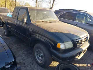 2002 Mazda B-Series 2WD Truck DS with VIN 4F4YR16U62TM20251, listed as a IAAI auction lot 41279080 with 302,481 mi miles. Bid and sale history available at carsss.com. Image 1.