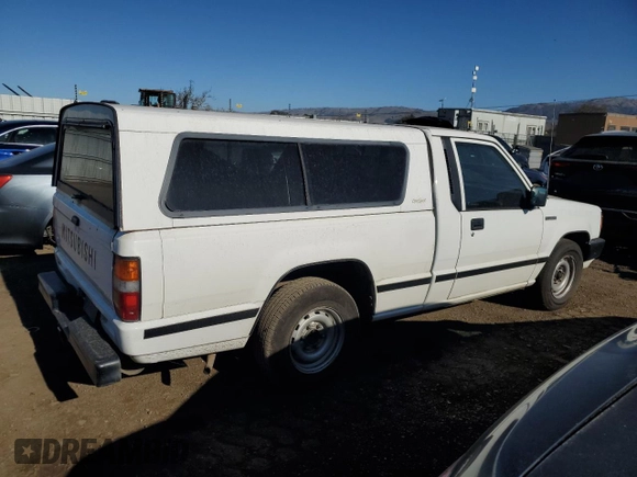 1990 Mitsubishi Mighty Max z VIN JA7FL24W3LP007688, wystawiony jako Copart lot #42651005 z przebiegiem 265 379 mil mil oraz Tytuł czysty. Historia ofert i sprzedaży dostępna na DreamBid. Obrazek 3.