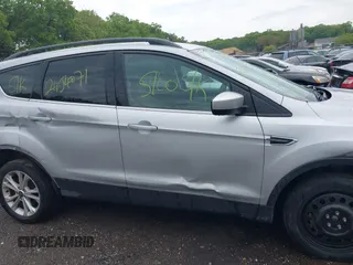 2018 Ford Escape SE with VIN 1FMCU9G99JUC41605, listed as a IAAI auction lot 39500946 with 114,032 mi miles. Bid and sale history available at carsss.com. Image 13.