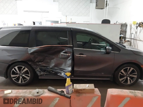 2021 Honda Odyssey Touring with VIN 5FNRL6H86MB026038, listed as a IAAI auction lot 41735249 with 68,480 mi miles. Bid and sale history available at carsss.com. Image 13.