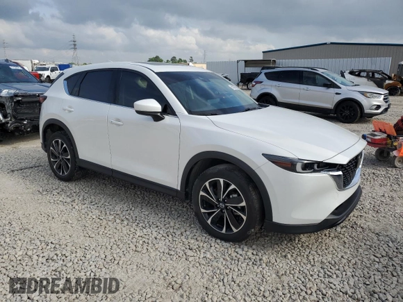 2023 Mazda CX-5 2.5 S Premium Package with VIN JM3KFBDM4P0131143, listed as a Copart auction lot 51627675 with 24,971 mi miles and Salvage Title. Bid and sale history available at carsss.com. Image 4.