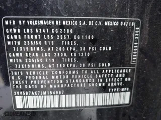 2018 Volkswagen Tiguan Wolfsburg Edition with VIN 3VV5B7AX7JM154967, listed as a IAAI auction lot 41433312 with 61,679 mi miles. Bid and sale history available at carsss.com. Image 9.