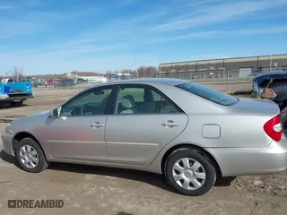 2004 Toyota Camry LE with VIN 4T1BE30K54U828326, listed as a IAAI auction lot 41876818 with 164,876 mi miles. Bid and sale history available at carsss.com. Image 14.