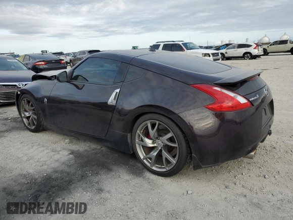 2014 Nissan 370Z Nismo with VIN JN1AZ4EH3EM633305, listed as a Copart auction lot 42846795 with 45,430 mi miles and Salvage Title. Bid and sale history available at DreamBid. Image 2.