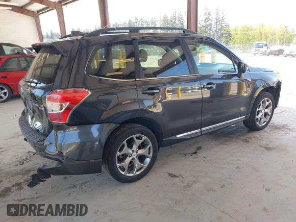 2016 Subaru Forester Touring with VIN JF2SJAXC0GH564305, listed as a IAAI auction lot 42111356 with 75,529 mi miles and . Bid and sale history available at DreamBid. Image 4.