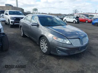 2011 Lincoln MKS EcoBoost with VIN 1LNHL9FT2BG606048, listed as a IAAI auction lot 41996420 with 135,212 mi miles and . Bid and sale history available at DreamBid. Image 1.