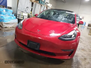2022 Tesla Model 3 with VIN 5YJ3E1EA8NF289661, listed as a Copart auction lot 52350675 with 153,797 mi miles and Salvage Title. Bid and sale history available at DreamBid. Image 5.