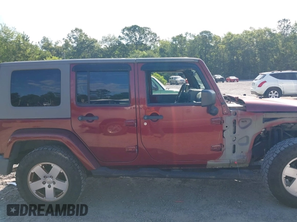 2007 Jeep Wrangler Unlimited Sahara с VIN 1J8GA59187L211825, выставлен на аукционе IAAI как лот 42313099 с пробегом 107 554 миль миль и . История ставок и продаж доступна на DreamBid. Изображение 14.