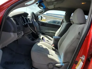 2010 Toyota Tacoma PreRunner with VIN 3TMKU4HN6AM025522, listed as a Copart auction lot 49092095 with 261,795 mi miles and Salvage title. Bid and sale history available at DreamBid. Image 7.