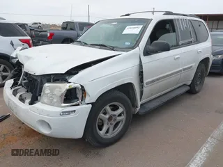 2003 GMC Envoy SLE with VIN 1GKDS13S532253648, listed as a IAAI auction lot 41850094 with 147,254 mi miles. Bid and sale history available at carsss.com. Image 2.
