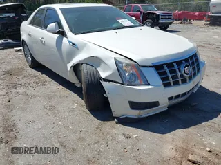 2012 Cadillac CTS z VIN 1G6DA5E51C0151324, wystawiony jako IAAI lot #41811207 z przebiegiem 100 407 mil mil oraz . Historia ofert i sprzedaży dostępna na DreamBid. Obrazek 6.