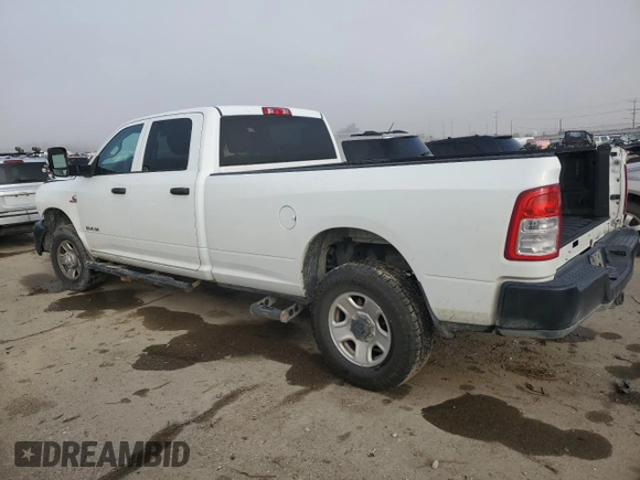 2020 Ram 3500 Tradesman with VIN 3C63R3GL2LG240887, listed as a Copart auction lot 84221034 with 102,225 mi miles and Salvage Title. Bid and sale history available at carsss.com. Image 2.