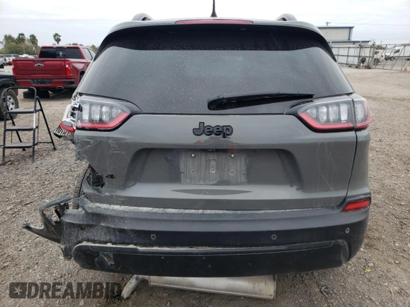2023 Jeep Cherokee Altitude Lux with VIN 1C4PJMMB0PD115196, listed as a Copart auction lot 41528365 with 27,059 mi miles and Salvage Title. Bid and sale history available at carsss.com. Image 6.
