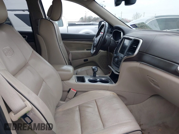 2014 Jeep Grand Cherokee Overland with VIN 1C4RJECG5EC207211, listed as a IAAI auction lot 41586309 with 115,293 mi miles. Bid and sale history available at carsss.com. Image 5.