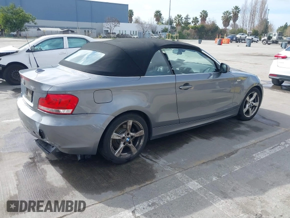 2012 BMW 1 Series 128i with VIN WBAUN1C52CVR00421, listed as a IAAI auction lot 41594256 with 107,957 mi miles and . Bid and sale history available at DreamBid. Image 4.