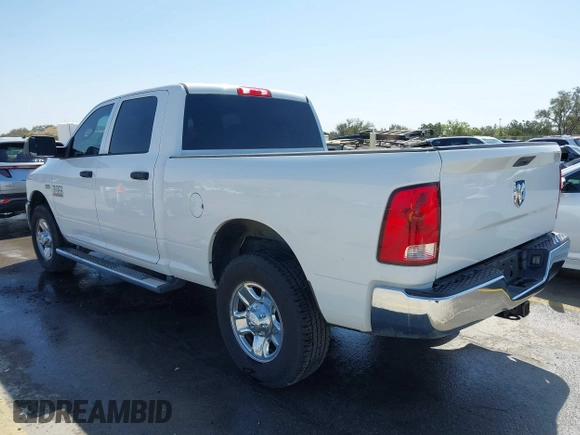 2014 Ram 2500 Tradesman with VIN 3C6TR4CT6EG243306, listed as a IAAI auction lot 41860120 with 101,110 mi miles and . Bid and sale history available at DreamBid. Image 3.