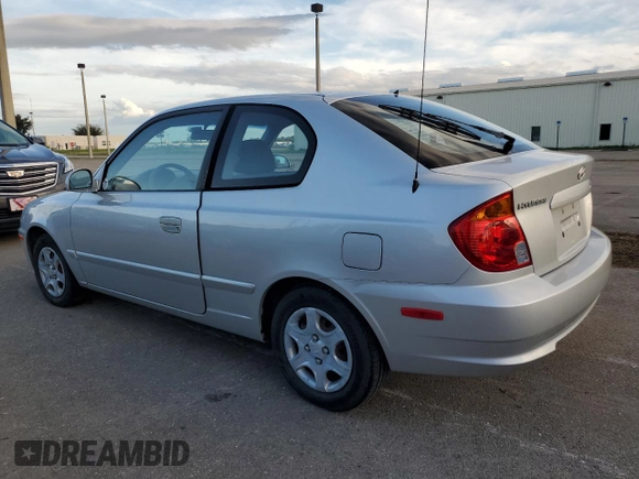 2004 Hyundai Accent GL with VIN KMHCG35C74U312579, listed as a Copart auction lot 75397884 with 0 mi miles and Salvage Title. Bid and sale history available at carsss.com. Image 2.