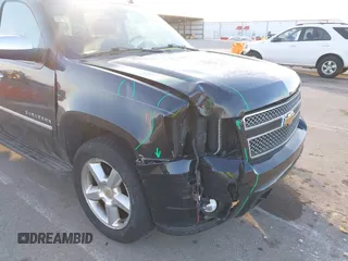 2010 Chevrolet Suburban LTZ with VIN 1GNUKKE3XAR142743, listed as a IAAI auction lot 41413380 with 236,384 mi miles. Bid and sale history available at carsss.com. Image 6.