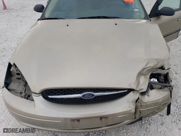 2001 Ford Taurus LX with VIN 1FAFP52U51A145880, listed as a Copart auction lot 77084934 with 54,143 mi miles and Salvage Title. Bid and sale history available at carsss.com. Image 11.