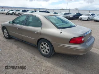 2002 Mercury Sable GS z VIN 1MEFM50U52A643924, wystawiony jako IAAI lot #41900910 z przebiegiem 150 413 mil mil oraz . Historia ofert i sprzedaży dostępna na DreamBid. Obrazek 3.