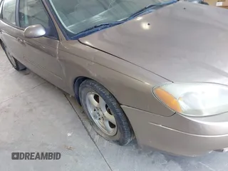 2002 Ford Taurus SES Standard with VIN 1FAFP55U32A171004, listed as a IAAI auction lot 41782261 with 105,967 mi miles. Bid and sale history available at carsss.com. Image 6.