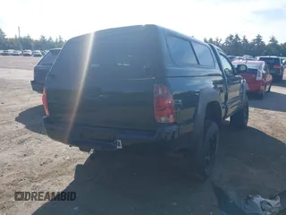 2012 Toyota Tacoma with VIN 5TFPX4ENXCX009676, listed as a IAAI auction lot 40458050 with 101,908 mi miles and . Bid and sale history available at DreamBid. Image 4.
