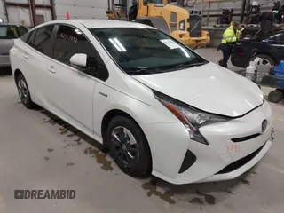 2018 Toyota Prius Two z VIN JTDKARFU5J3055225, wystawiony jako IAAI lot #42313092 z przebiegiem 92 344 mil mil oraz . Historia ofert i sprzedaży dostępna na DreamBid. Obrazek 1.