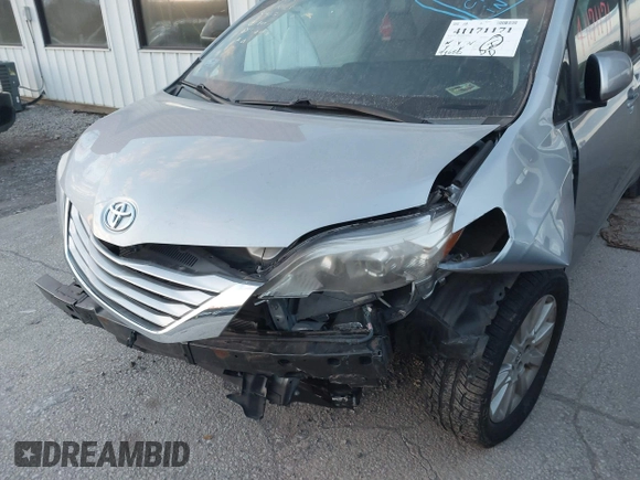 2016 Toyota Sienna LE with VIN 5TDJK3DC4GS133694, listed as a IAAI auction lot 41171171 with 99,680 mi miles. Bid and sale history available at carsss.com. Image 6.