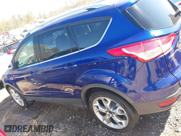 2015 Ford Escape Titanium with VIN 1FMCU0J93FUC20745, listed as a IAAI auction lot 41781551 with 174,538 mi miles and . Bid and sale history available at DreamBid. Image 15.