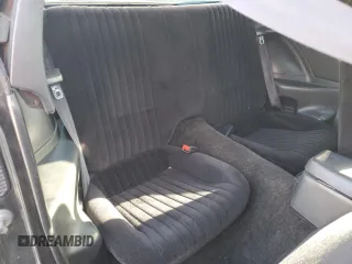 1989 Pontiac Firebird z VIN 1G2FS2186KL212458, wystawiony jako Copart lot #56995025 z przebiegiem 89 851 mil mil oraz Szkoda całkowita • Salvage title. Historia ofert i sprzedaży dostępna na DreamBid. Obrazek 10.