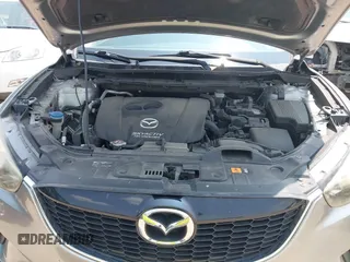 2014 Mazda CX-5 Sport with VIN JM3KE4BE9E0411177, listed as a IAAI auction lot 42411938 with 167,709 mi miles and . Bid and sale history available at DreamBid. Image 10.