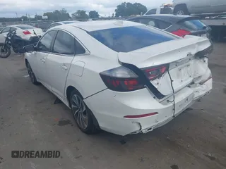 2019 Honda Insight Touring with VIN 19XZE4F91KE007748, listed as a IAAI auction lot 40233174 with 78,036 mi miles and . Bid and sale history available at DreamBid. Image 3.