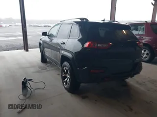 2014 Jeep Cherokee Trailhawk with VIN 1C4PJMBS3EW150366, listed as a IAAI auction lot 41971035 with 90,994 mi miles. Bid and sale history available at carsss.com. Image 3.