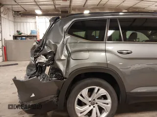 2021 Volkswagen Atlas SE z VIN 1V2KR2CA5MC606590, wystawiony jako IAAI lot #42383813 z przebiegiem 45 087 mil mil oraz . Historia ofert i sprzedaży dostępna na DreamBid. Obrazek 17.