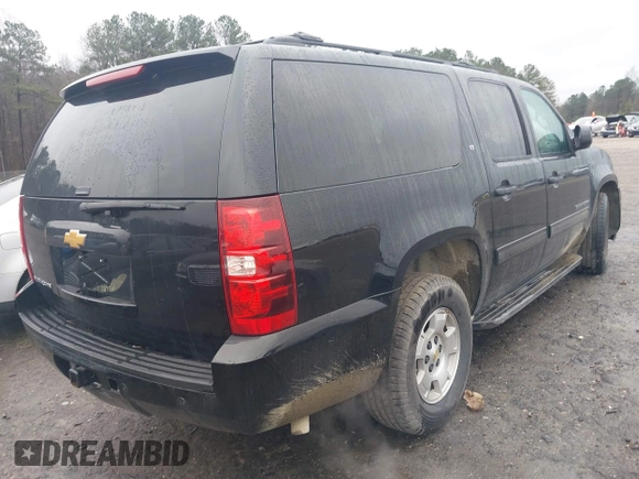 2014 Chevrolet Suburban LT with VIN 1GNSCJE06ER233762, listed as a IAAI auction lot 41515686 with 125,442 mi miles. Bid and sale history available at carsss.com. Image 4.
