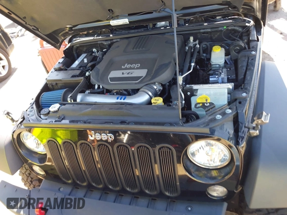 2015 Jeep Wrangler Rubicon Hard Rock with VIN 1C4BJWCG1FL610028, listed as a IAAI auction lot 42318569 with 48,627 mi miles and . Bid and sale history available at DreamBid. Image 10.