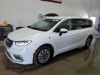 2023 Chrysler Pacifica Hybrid Touring L with VIN 2C4RC1L75PR611607, listed as a Copart auction lot 61475985 with 63,241 mi miles and Clean title. Bid and sale history available at DreamBid. Image 1.