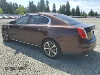 2009 Lincoln MKS z VIN 1LNHM94R89G601127, wystawiony jako Copart lot #60551075 z przebiegiem 102 000 mil mil oraz Szkoda całkowita • Salvage title. Historia ofert i sprzedaży dostępna na DreamBid. Obrazek 2.